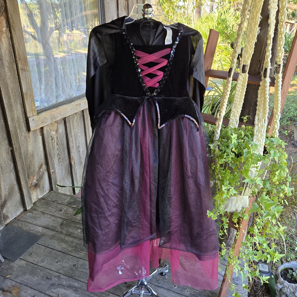Girl's burgundy and black vampire costume with attached cape